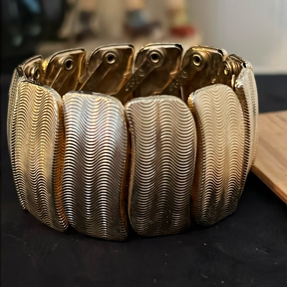 Coro stretch gold tone bracelet
